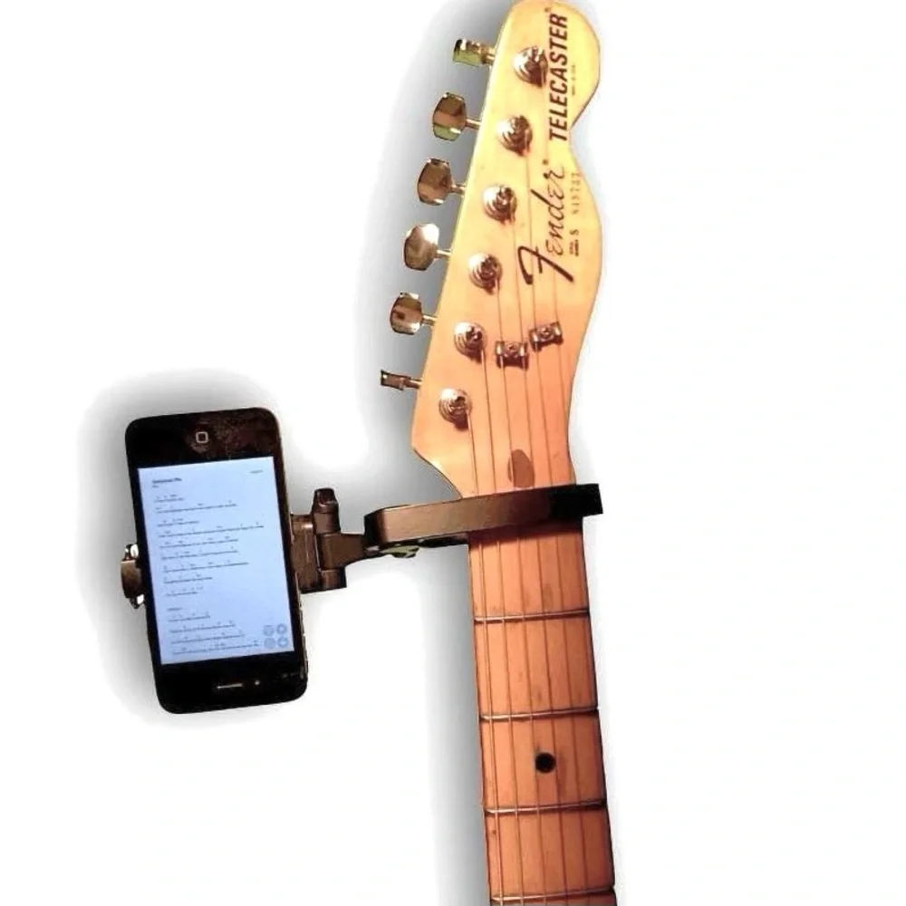 Smart-Po is the patented capo that holds your smartphone